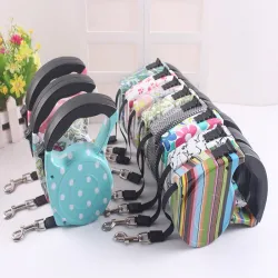 La laisse rétractable automatique du chien - harnais